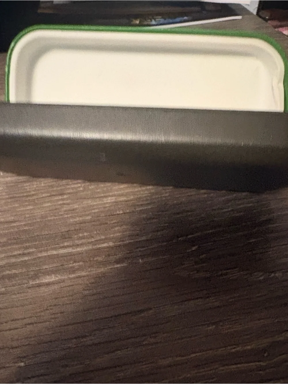 kate spade Green glass case. Has flaw on front.